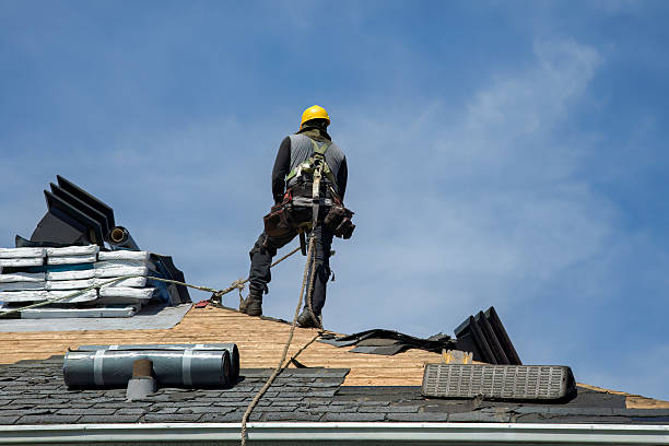 Professional Roofing technician working in Adrian, MI